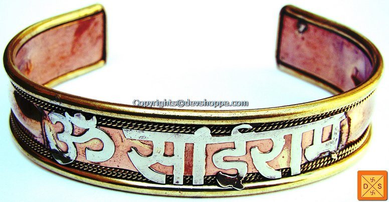 Om Sai Ram bracelet with wide metallic band and colorful lettering