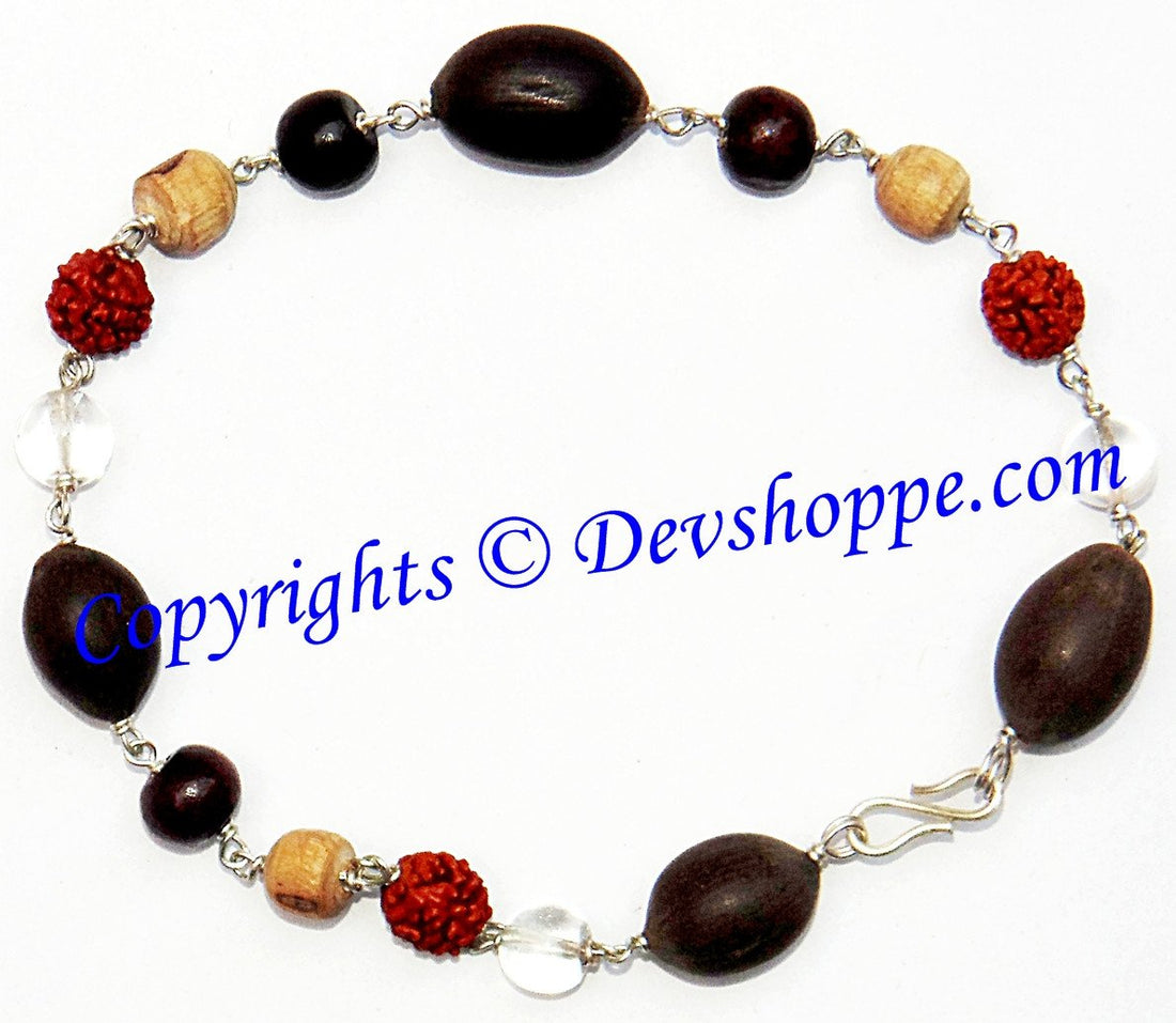 White metal Panchbhoot bracelet with dark oval beads, red and gold beads, crystal accents