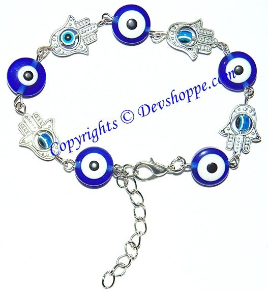 Silver charm bracelet with blue evil-eye beads, hamsa charms, chain extender