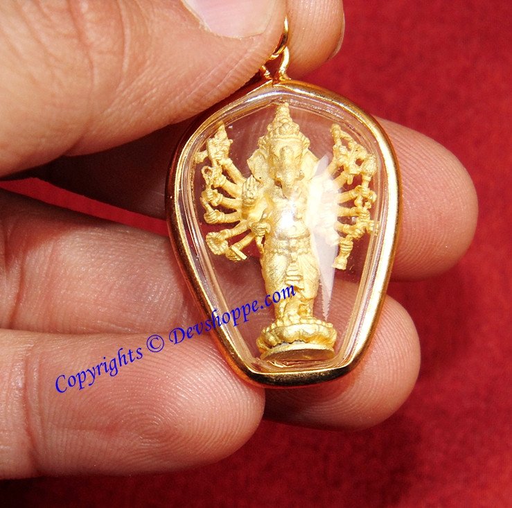 Teardrop Ganesha pendant with gold warrior deity in clear glass frame