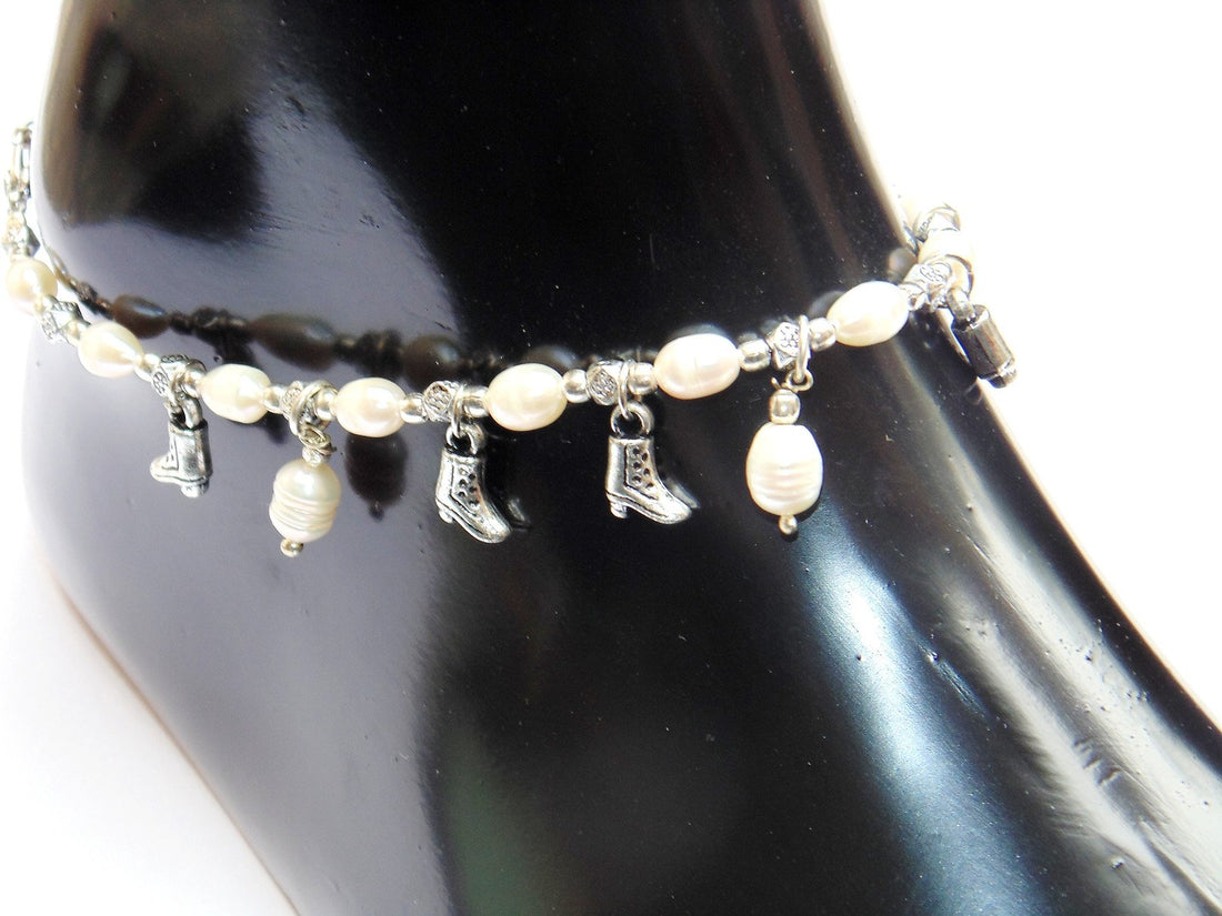 Pearl anklet with round pearl beads and silver-tone charm pendants on chain
