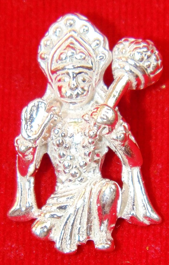 Pure silver Hanuman sitting pendant, detailed face and hands in front view
