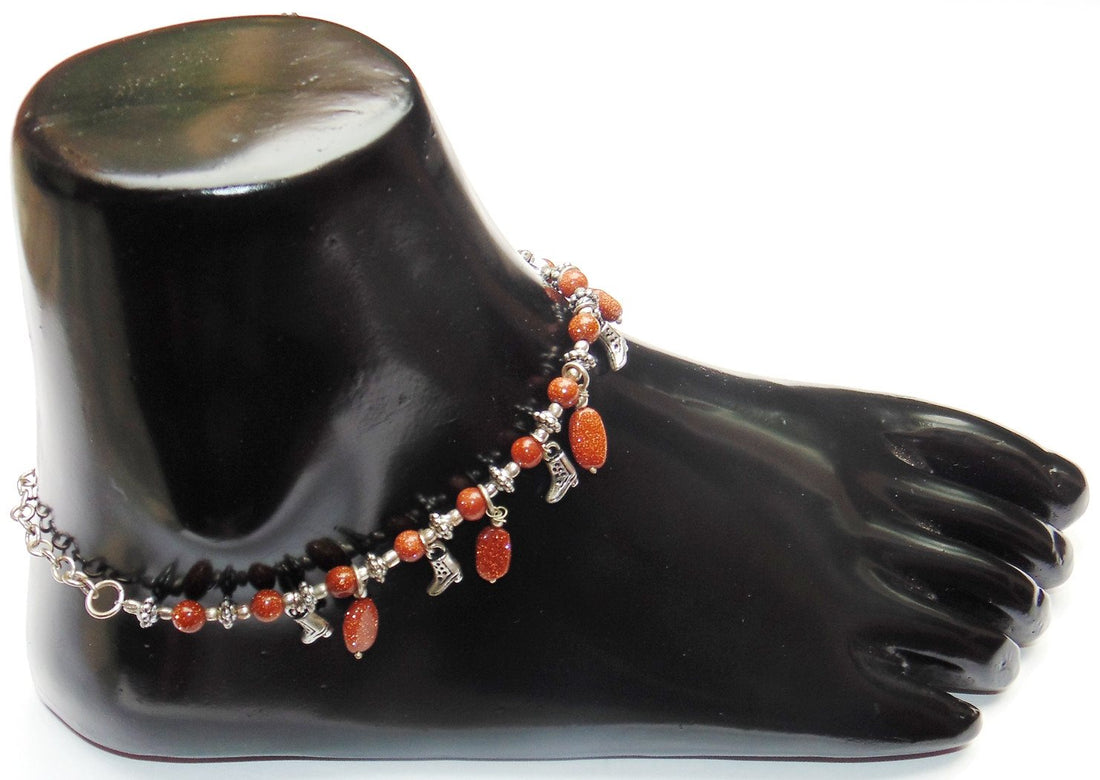Sunstone bead anklet with orange stones, silver charms and black bead accents