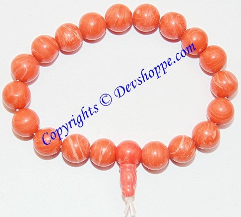 Orange round bead churu bracelet with small tassel charm