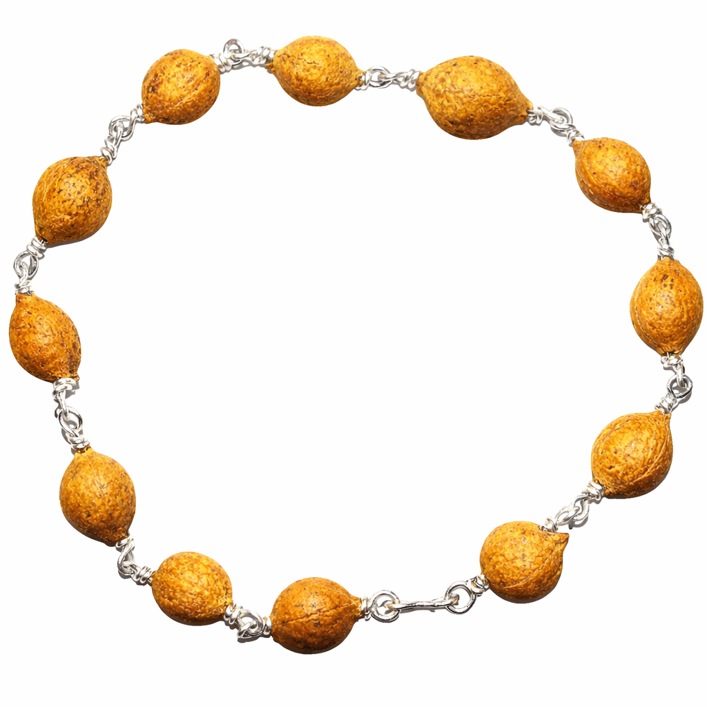 Seed bracelet with white metal wire and natural seed beads, oval beads and chain links