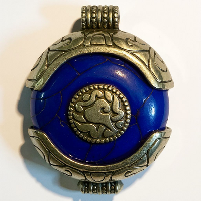 Ethnic Tibetan Blue Resin Ghau Amulet Charm Pendant with Tibetan Silver Caps, Auspicious Conch symbol & Coral bead Inlay Accent