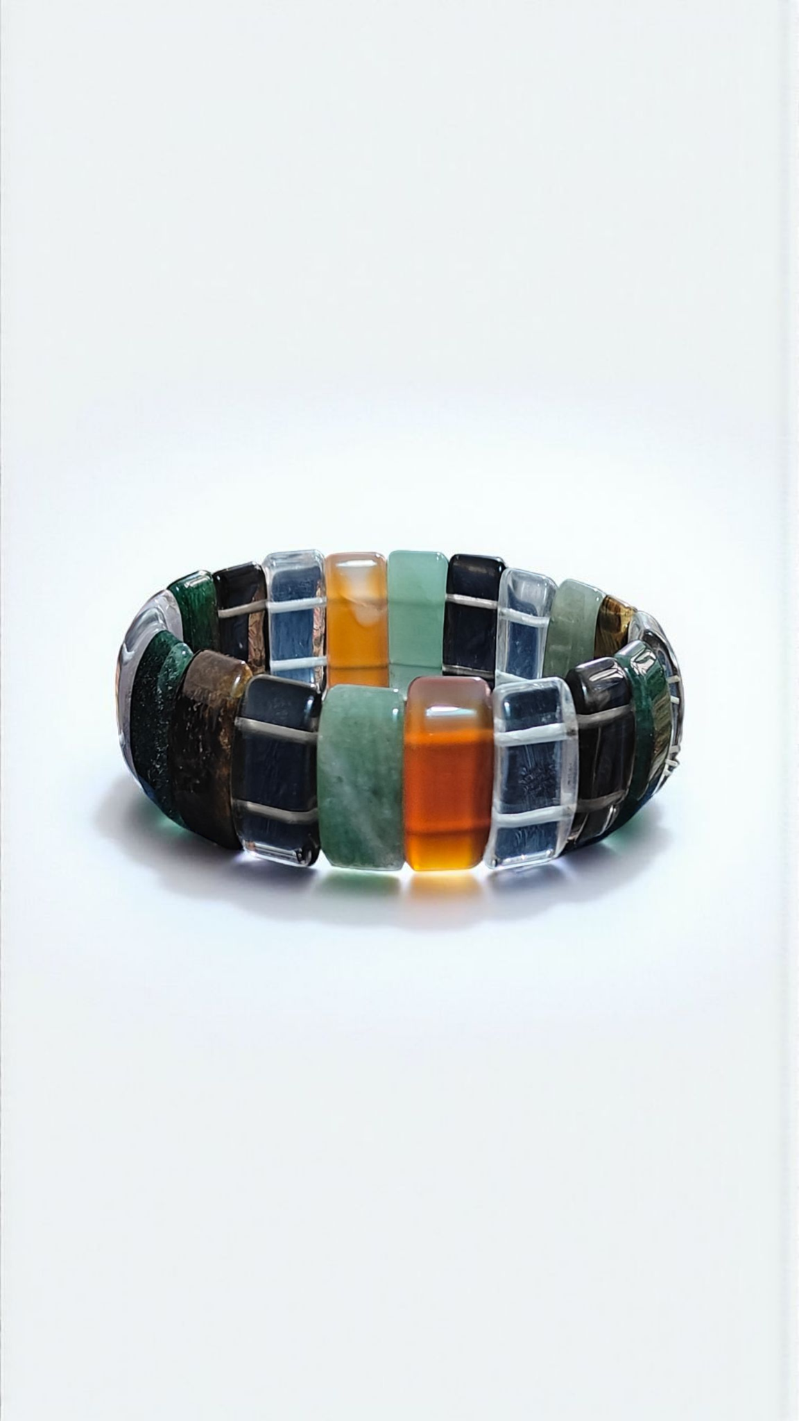 Multi-stone beaded bracelet with rectangular glass segments in green, orange, black shades