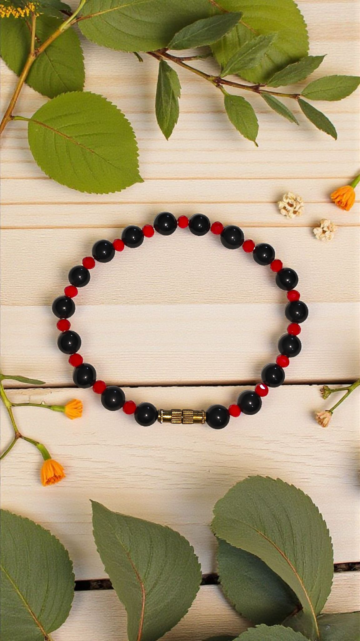 Black Hakik wristband with red glass spacers