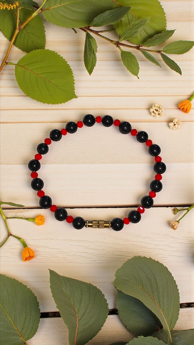 Black Hakik wristband with red glass spacers