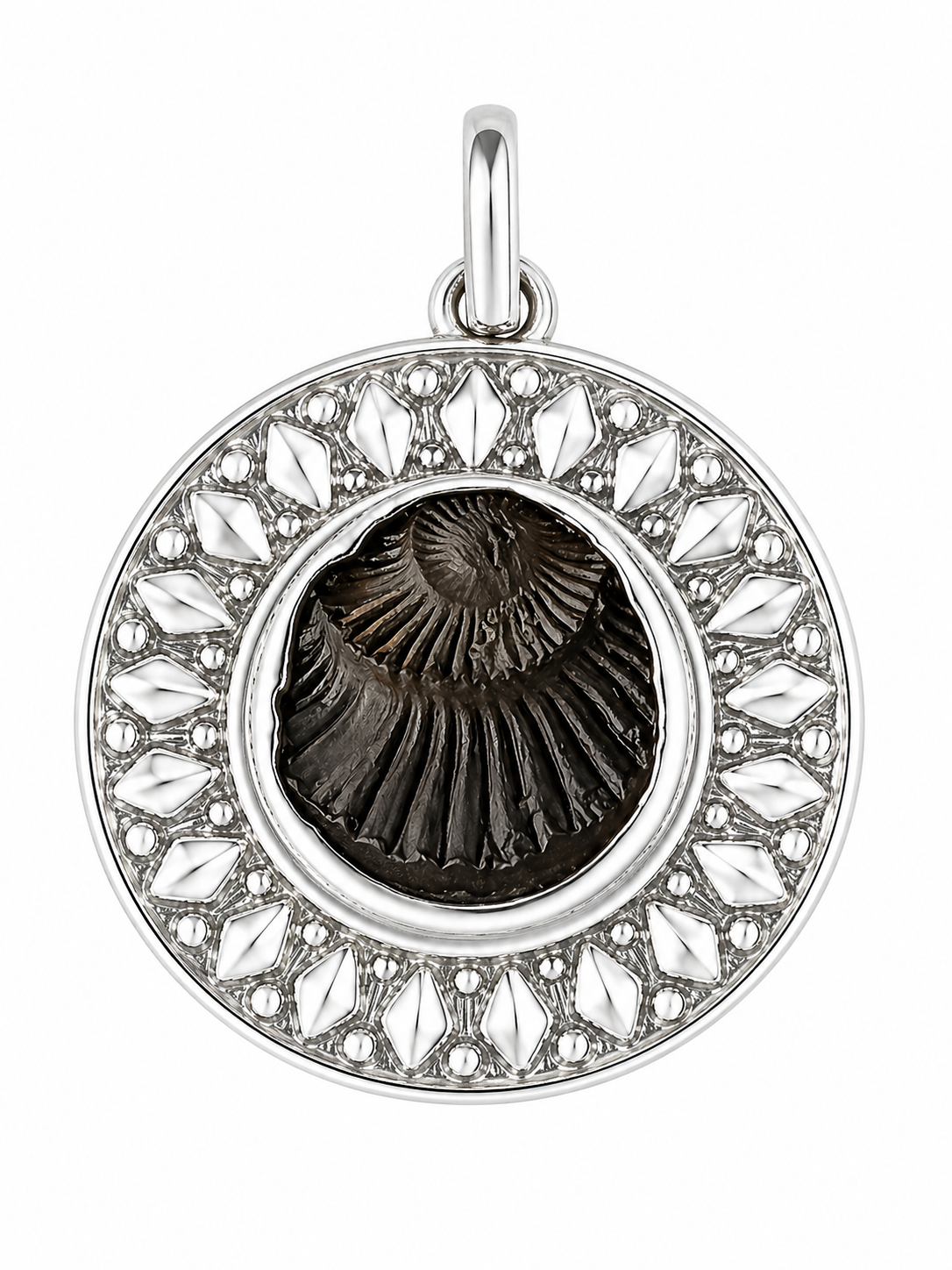 Silver pendant with round filigree rim and dark Shaligram-style center medallion