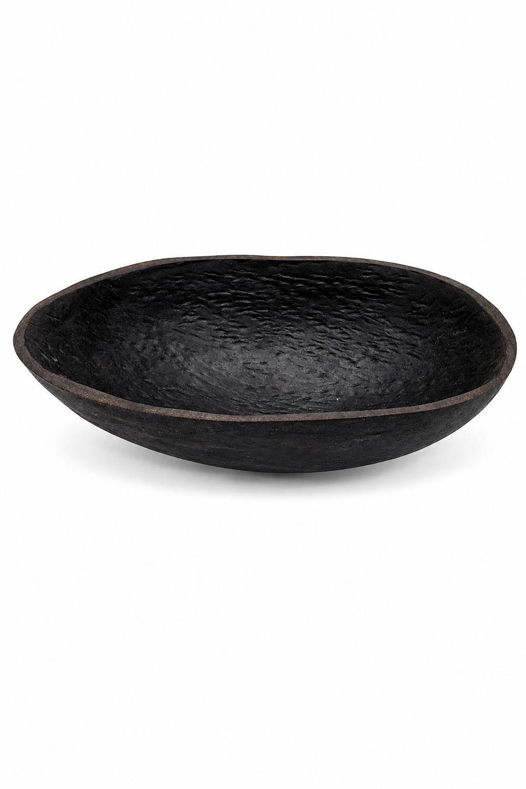 Black coconut-shell ritual bowl with shallow, wide concave interior