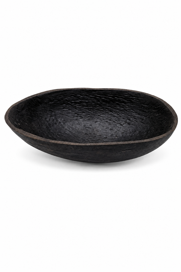 Black coconut-shell ritual bowl with shallow, wide concave interior