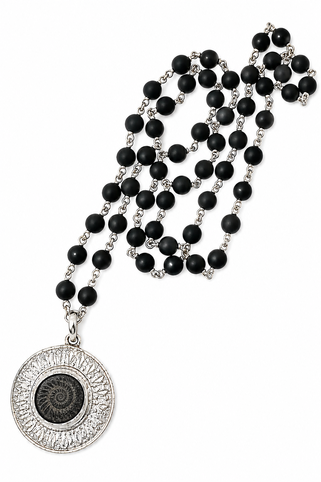 Close-up of black bead mala with silver wire and round Shaligram Sudarshan pendant