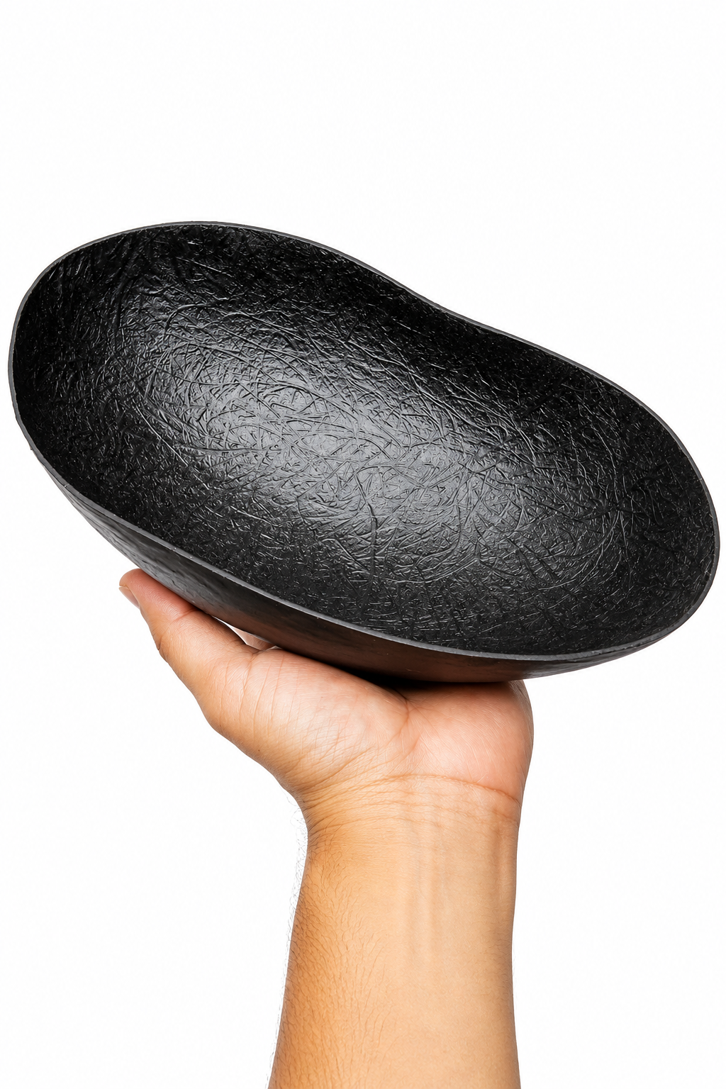 Black oval khappar bowl held in hand, shallow wide sadhana vessel