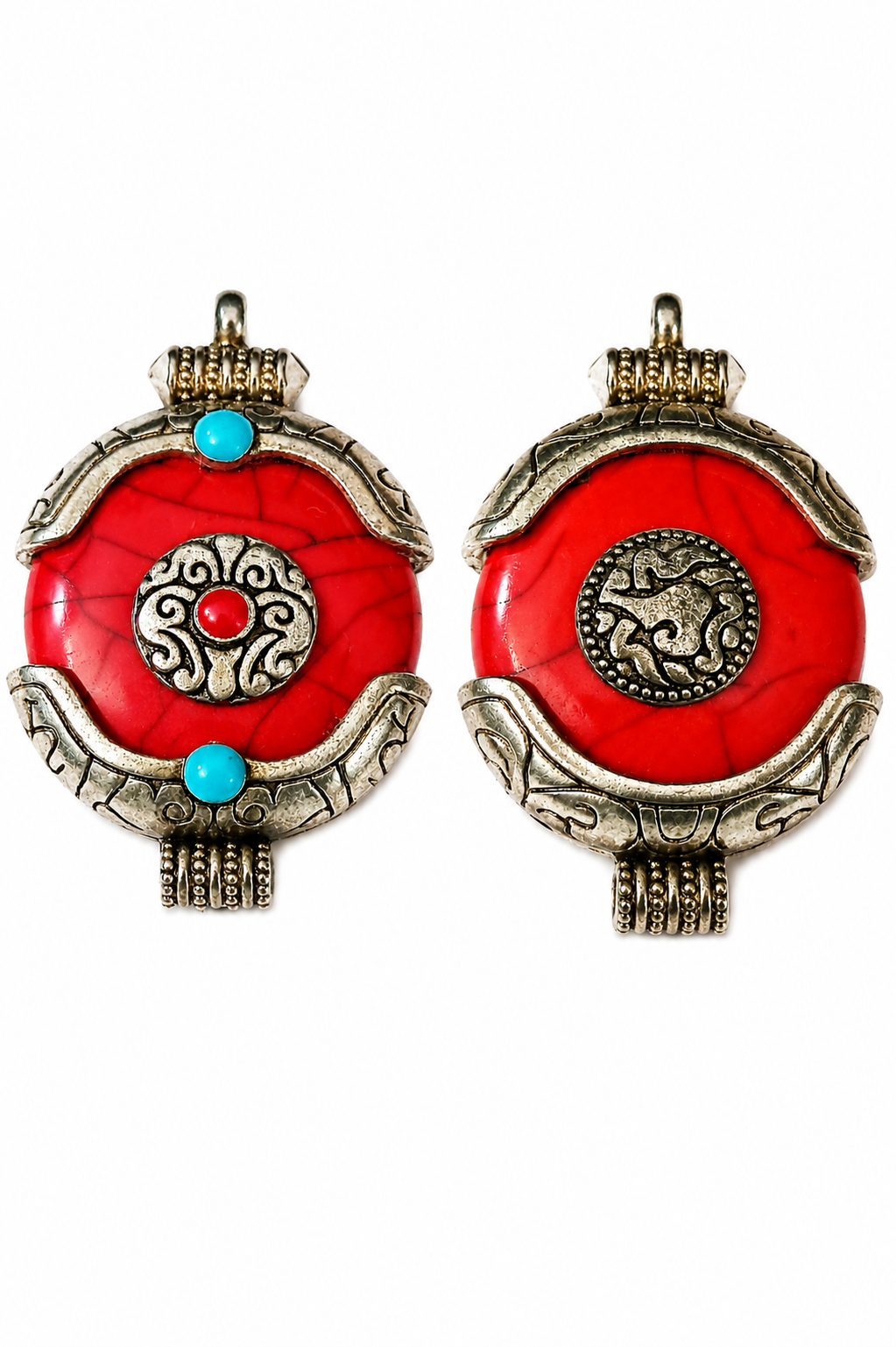 Close-up of red crackle resin Ghau charm pendant with silver-tone caps and turquoise beads