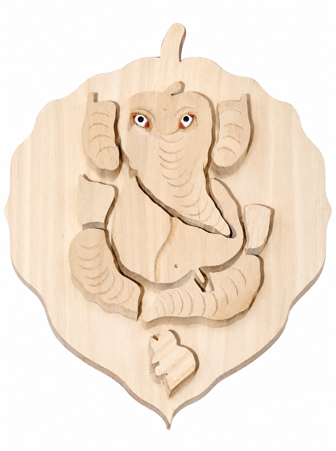 Wooden Ganesha carved on peepal leaf wall hanging with red-eyed face, light wood