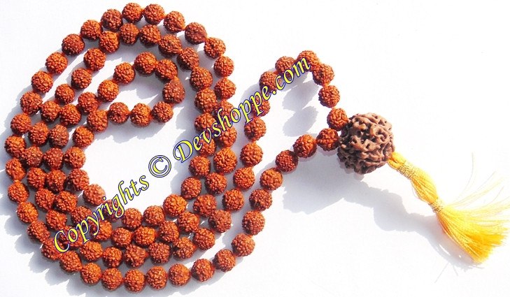 Rudraksha mala with large seven-faced Sumeru bead and yellow tassel, five-faced beads