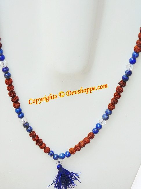 Alternating brown and blue mala beads necklace with small blue tassel end
