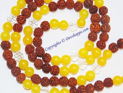 Rudraksha and yellow jade beaded mala with gold-tone clasp, tassel detail