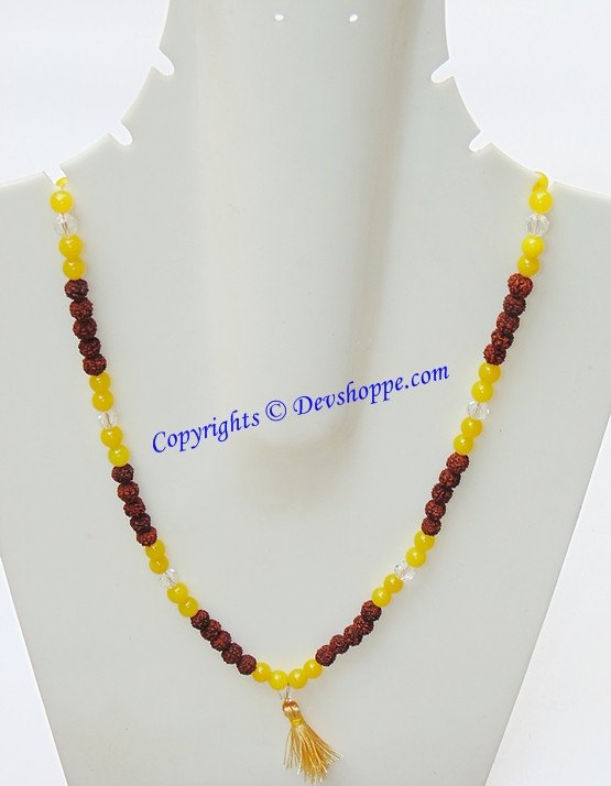 Rudraksha and yellow jade combination mala on display with gold-tone tassel
