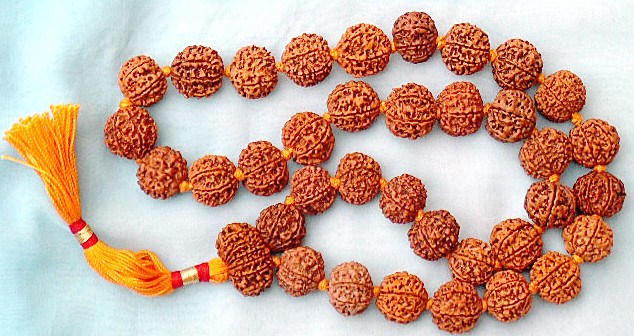 Saturn rudraksha mala with round orange-brown beads and yellow tassel