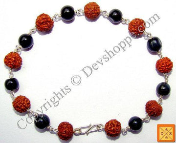 Rudraksha & cat's eye bead bracelet: red textured beads, black round stones, silver chain clasp