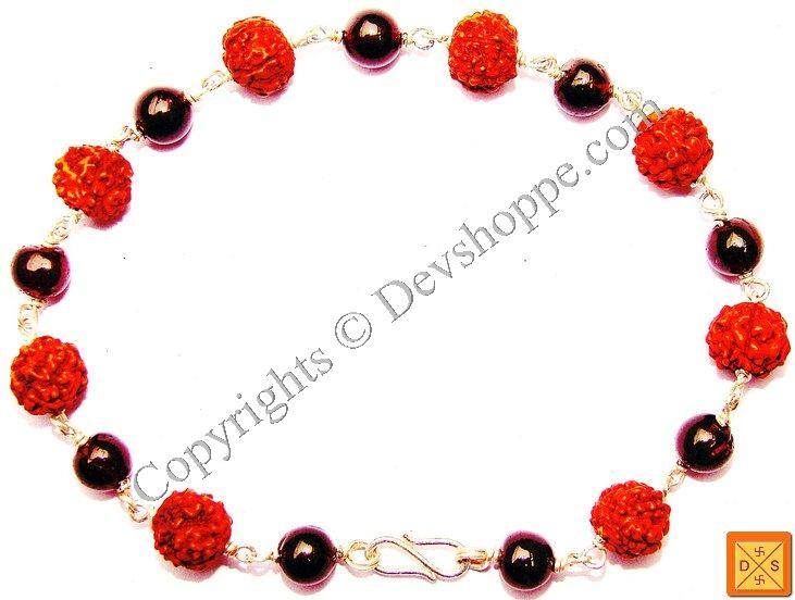 Rudraksha and garnet beaded bracelet with red and dark beads, silver clasp