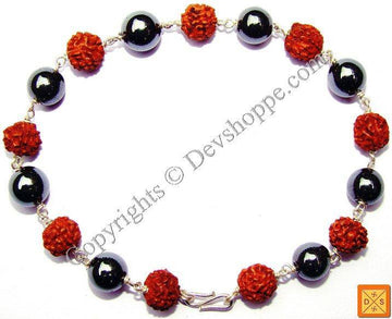 Rudraksha & hematite bracelet: dark beads, orange rudraksha beads, silver chain links