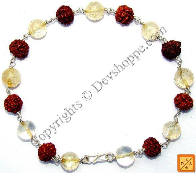 Rudraksha Citrine combination bracelet with dark red textured beads and pale yellow stones.