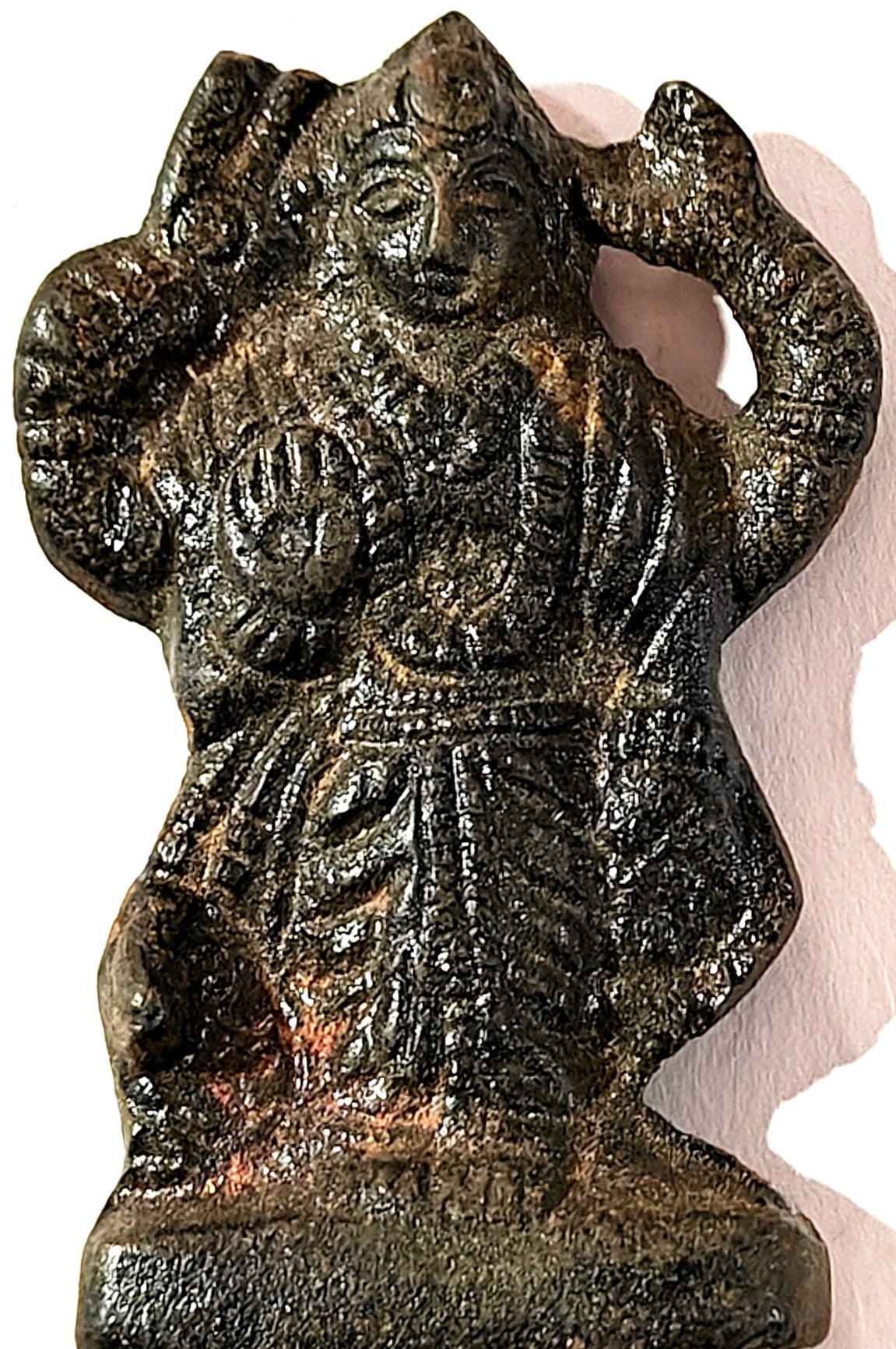 Shanidev iron idol, small metal figurine with detailed seated deity.