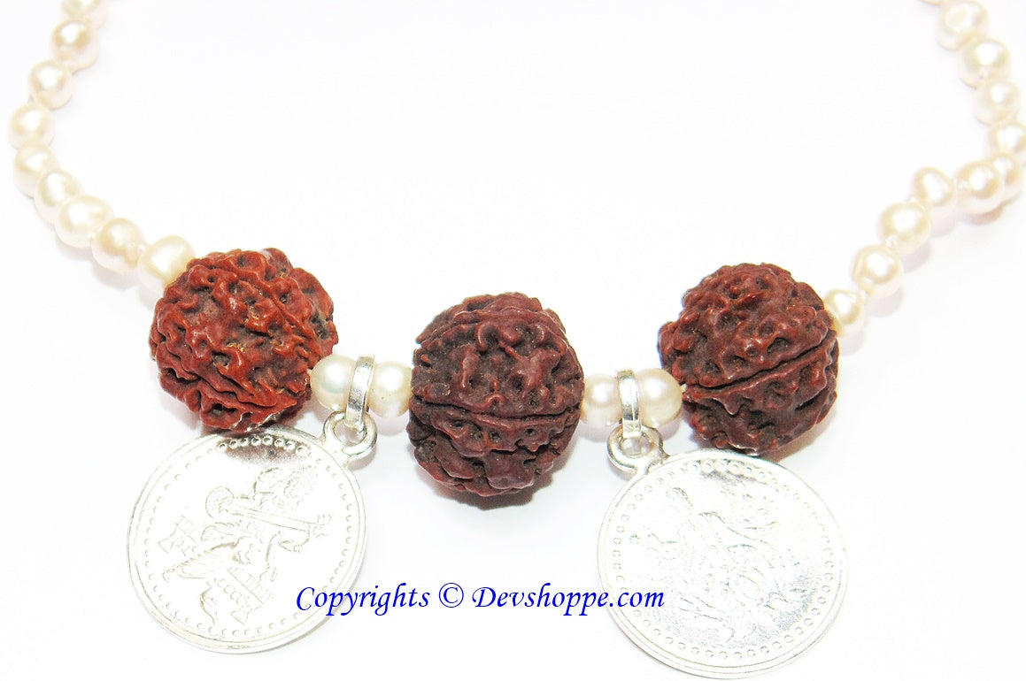 Kids pearl mala with three silver yantra pendants and red bead accents