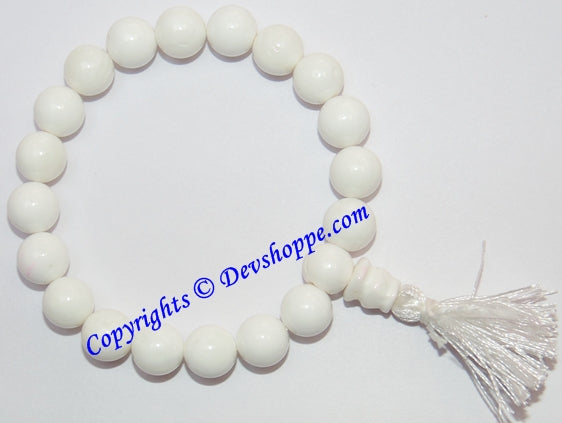 White agate power bracelet with round beads and white tassel on stretch elastic