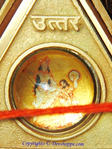 Sri Baglamukhi Raksha Yantra Chowki close-up, gold panel with inner circular deity image