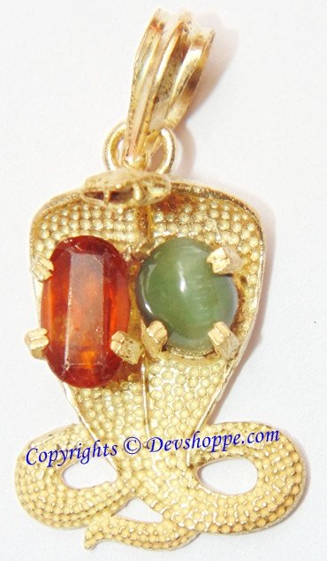 Kaal Sarp dosh nivaran pendant with gold-tone serpent, red and green inset stones