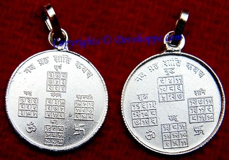 Silver circular Navagraha yantra pendant with detailed engraved mantras, two hanging pieces