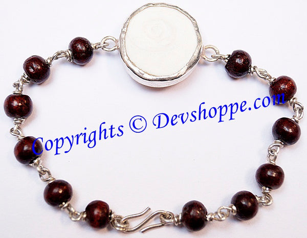 Gomti Chakra bracelet with Red Sandalwood beads in pure silver