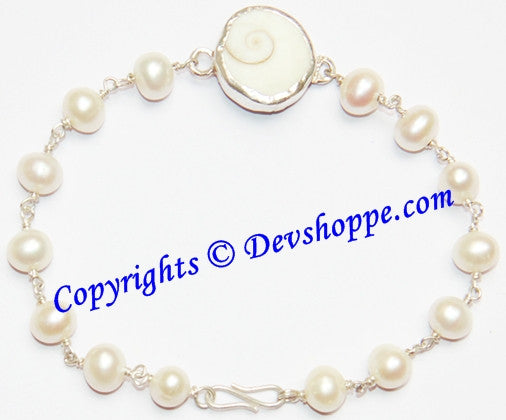 Gomti Chakra bracelet with Pearl beads in pure silver
