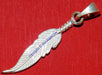 Silver feather shaped pendant Lucky charm - Devshoppe
